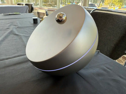 "Gravity Universe Time": A magnetic clock featuring a levitating miniature planet as its pointer