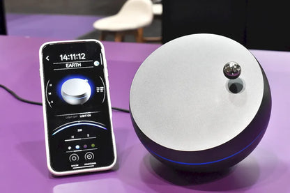 "Gravity Universe Time": A magnetic clock featuring a levitating miniature planet as its pointer